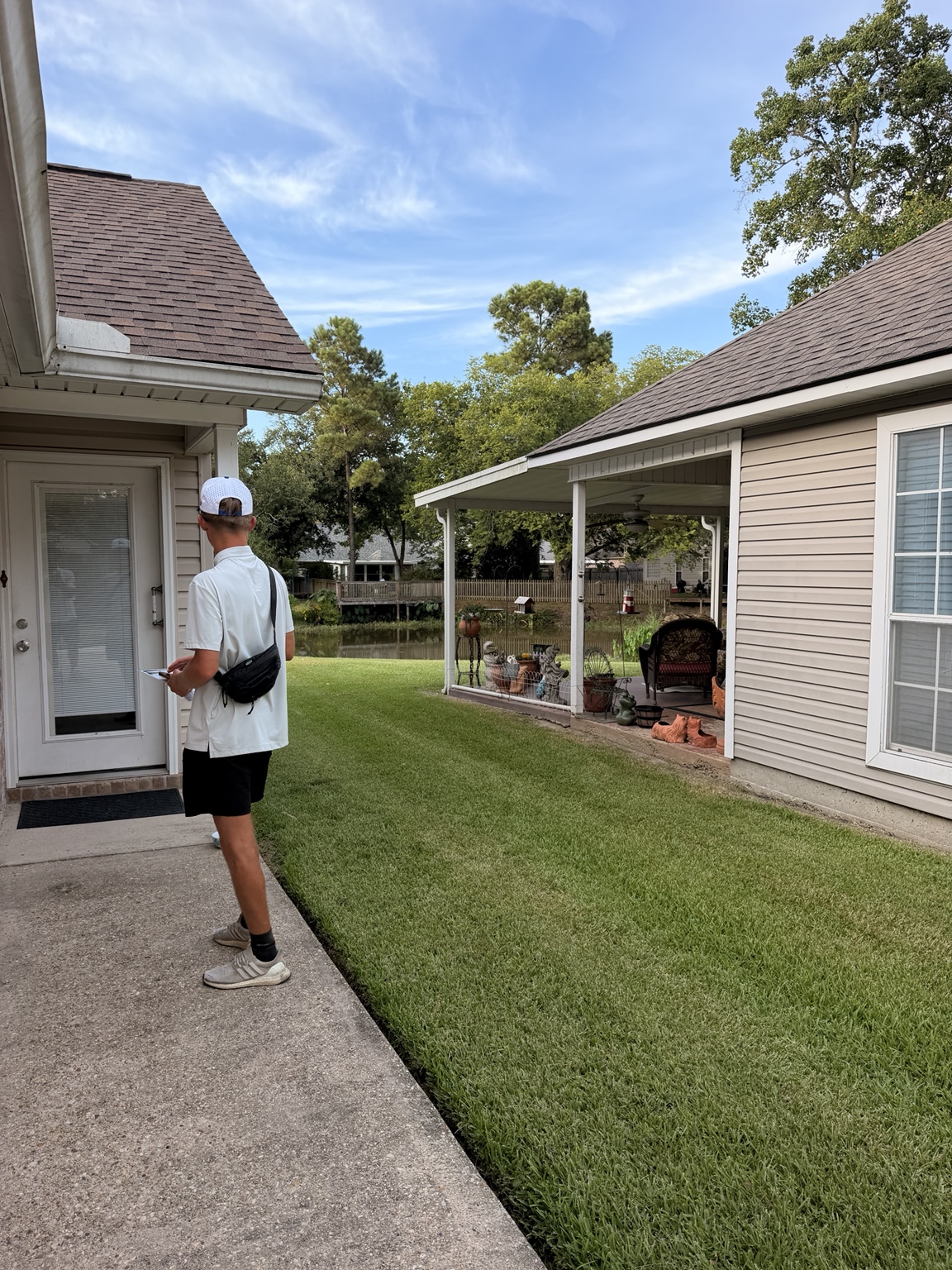 A Rally sales representative at a homeowner’s front door