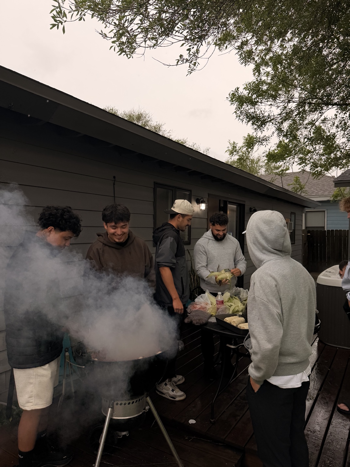Rally teammates cooking together at their shared home